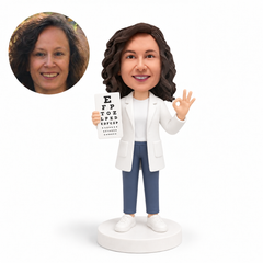 custom bobblehead figure female ophthalmologist holding an eye chart