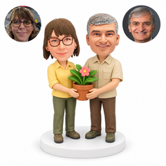 custom bobbleheads figures gardener couple holding a potted plant