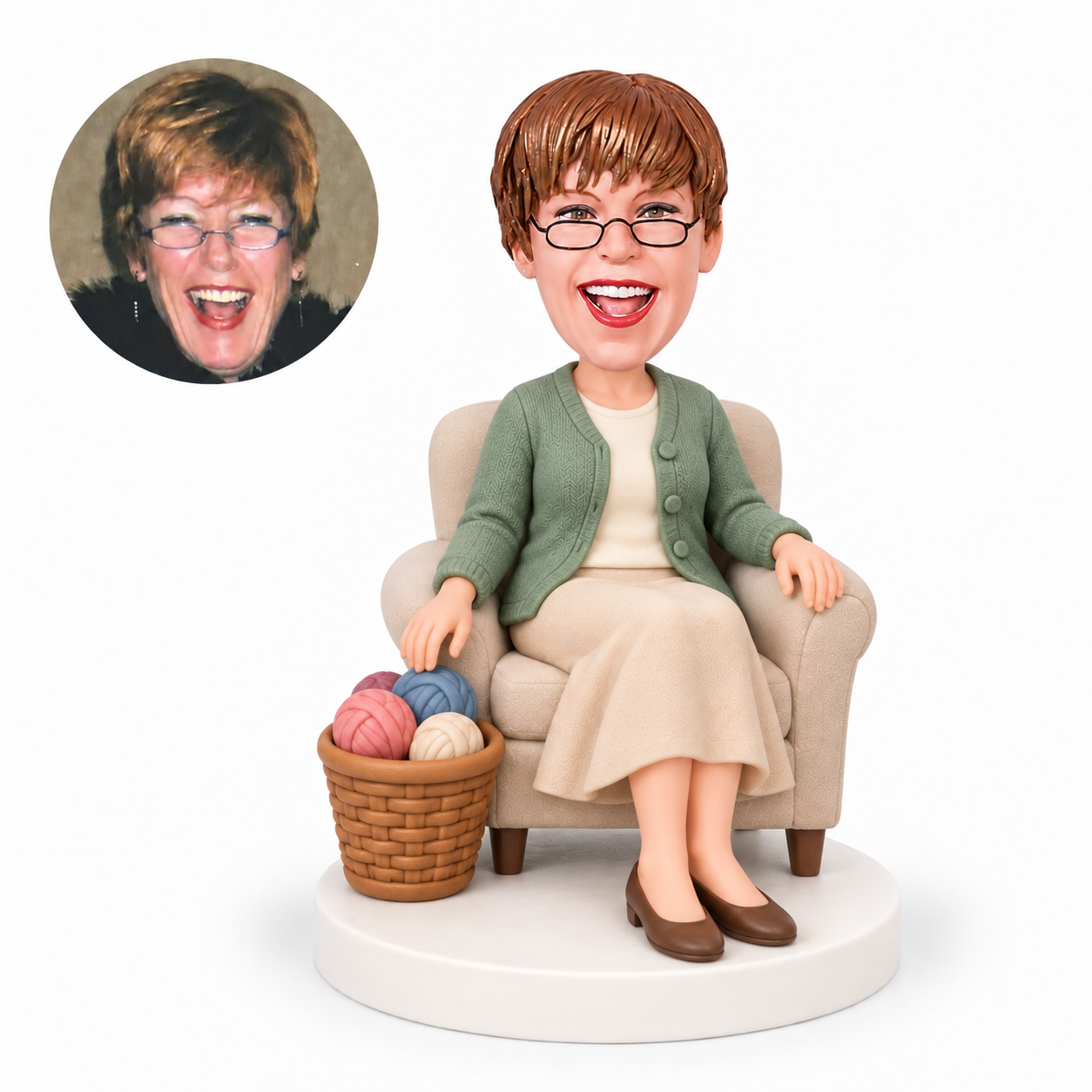 custom bobblehead figure woman seated in an armchair beside a yarn basket