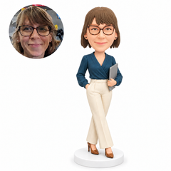 custom bobblehead figure businesswoman in a wrap blouse holding a folder