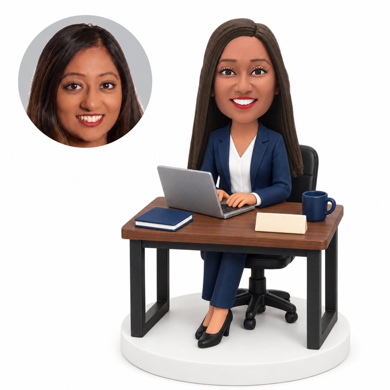 custom bobblehead figure businesswoman in a pantsuit working at a laptop