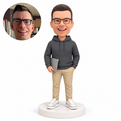 custom bobblehead figure man in a hoodie holding a tablet