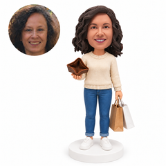 custom bobblehead figure woman holding a wallet and shopping bags