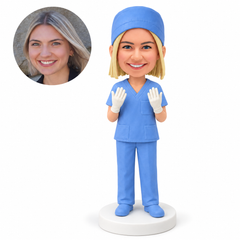 custom bobblehead figure female surgeon with both gloved hands raised