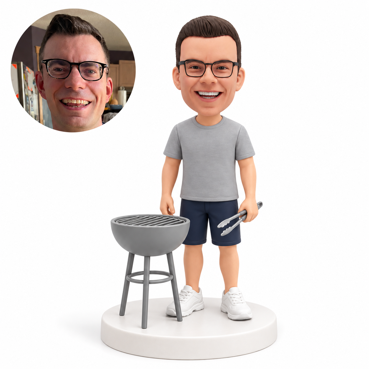 custom bobblehead figure man holding tongs beside a simple kettle grill