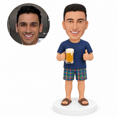 custom bobblehead figure man in a T-shirt and shorts holding a beer mug and giving a thumbs up