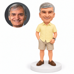 custom bobblehead figure man in a short sleeve button shirt and shorts with one hand in his pocket