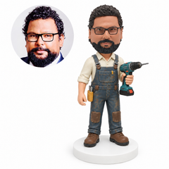 custom bobblehead figure male mechanic in overalls holding an electric drill