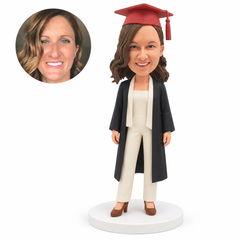 custom bobblehead figure female graduate in a trouser outfit and an open gown - custom polymer clay bobblehead figure