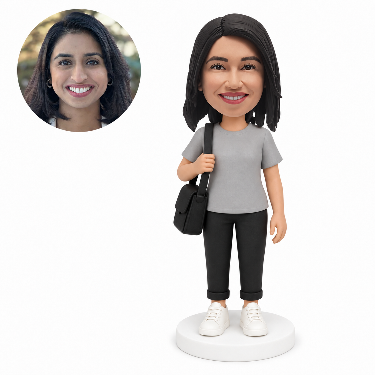 custom bobblehead figure woman in a t-shirt holding the strap of a shoulder bag