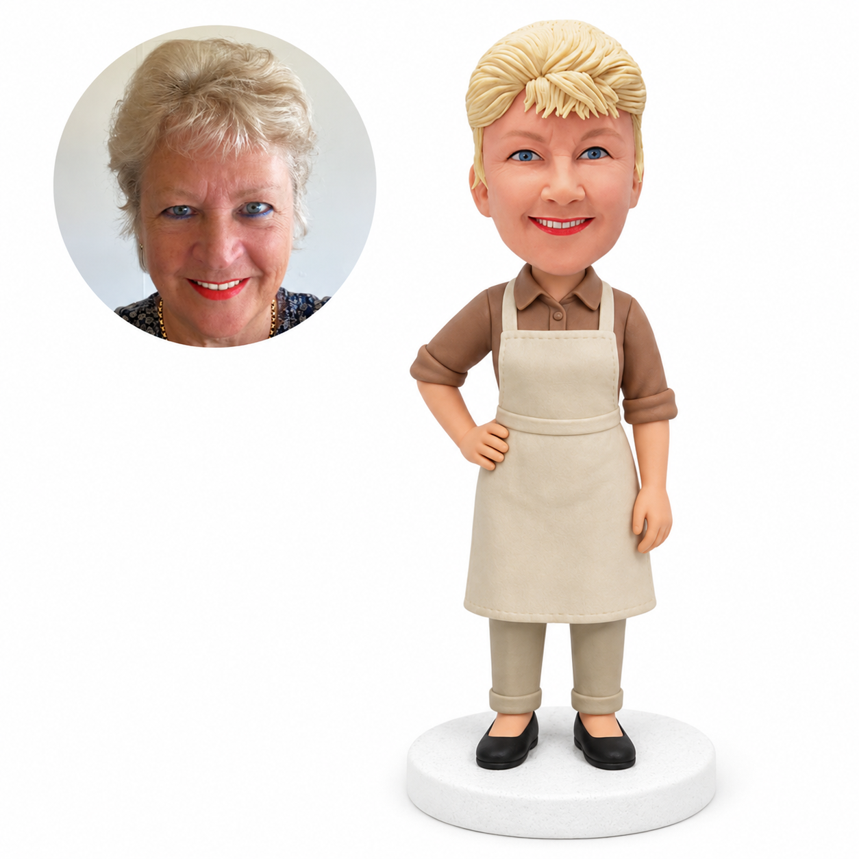 custom bobblehead figure woman in a collared shirt and apron with one hand on her hip