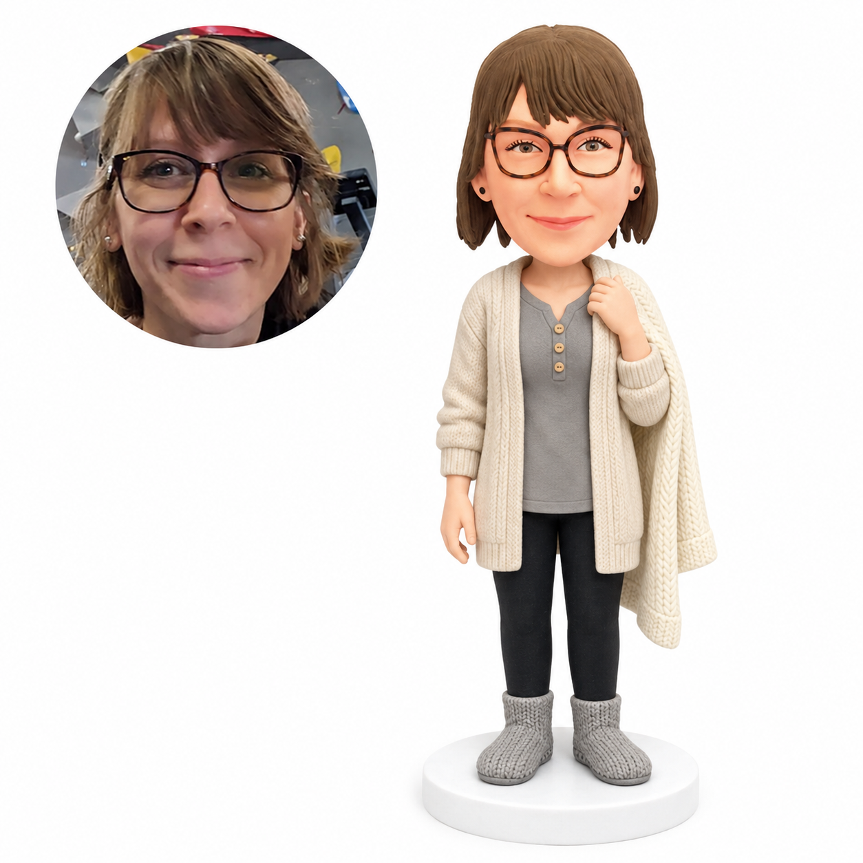 custom bobblehead figure woman in a knitted cardigan holding a blanket over her shoulder
