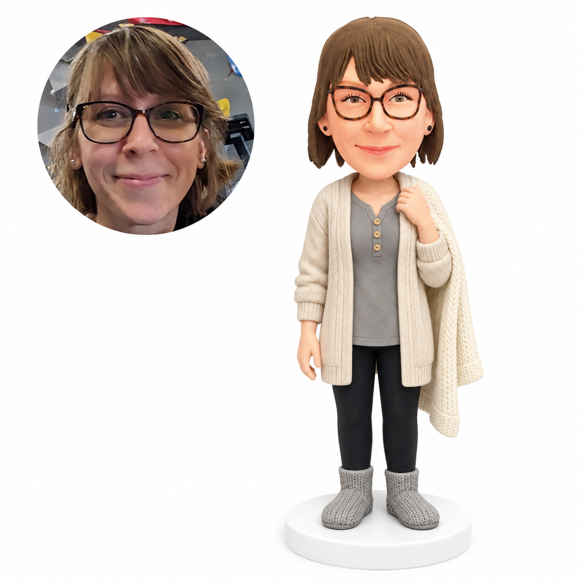 custom bobblehead figure woman in a knitted cardigan holding a blanket over her shoulder