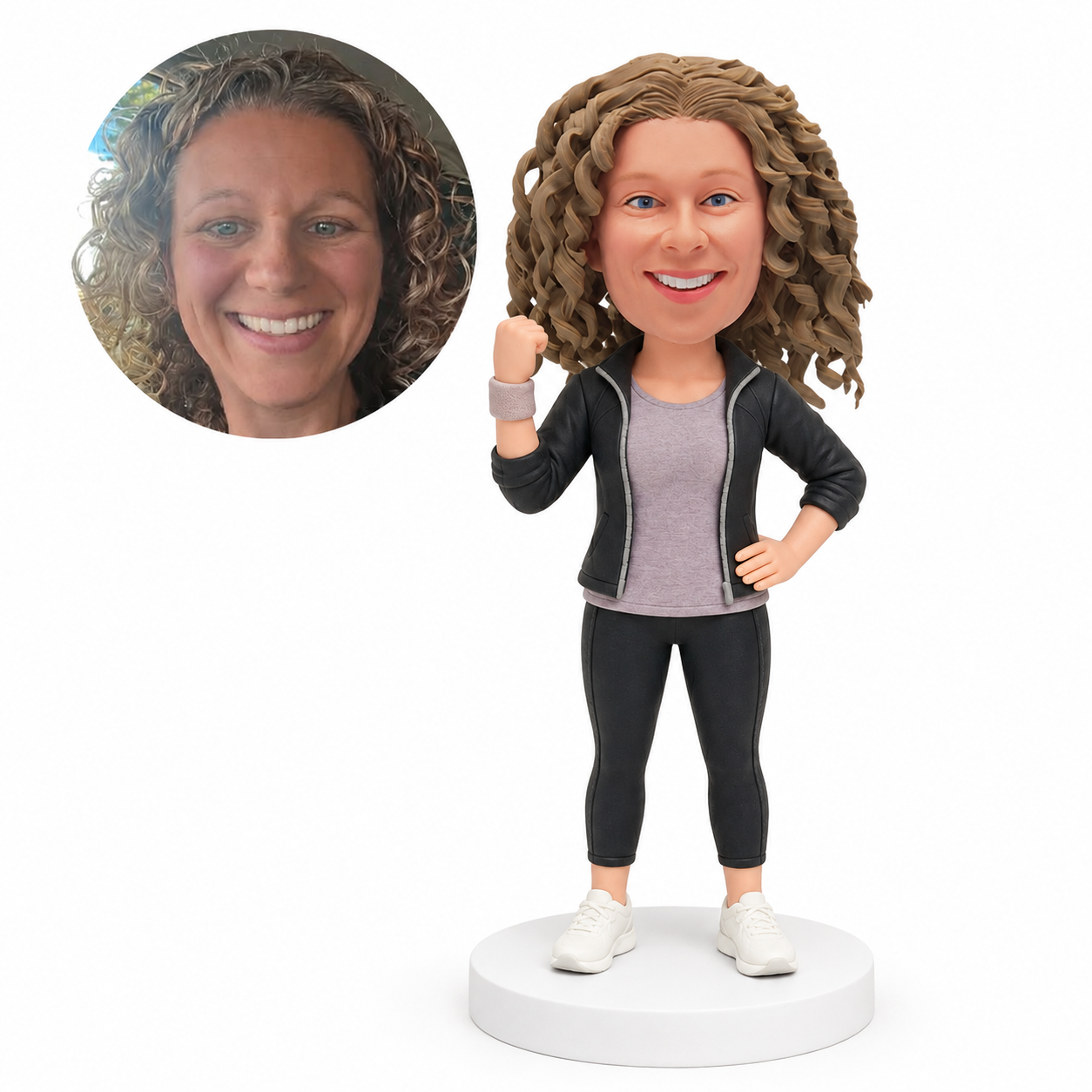 custom bobblehead figure woman in a sports jacket raising a fist with one hand on her hip