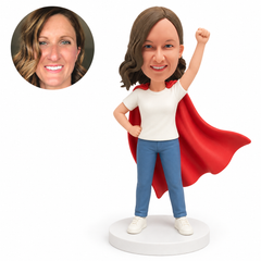 custom bobblehead figure woman in a cape and t-shirt raising a fist