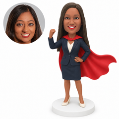 custom bobblehead figure woman in a skirt suit and cape raising a fist