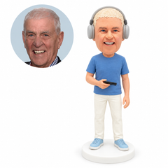 custom bobblehead figure man wearing headphones and holding a phone