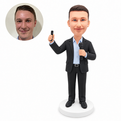 custom bobblehead figure male speaker holding a microphone and a presentation remote