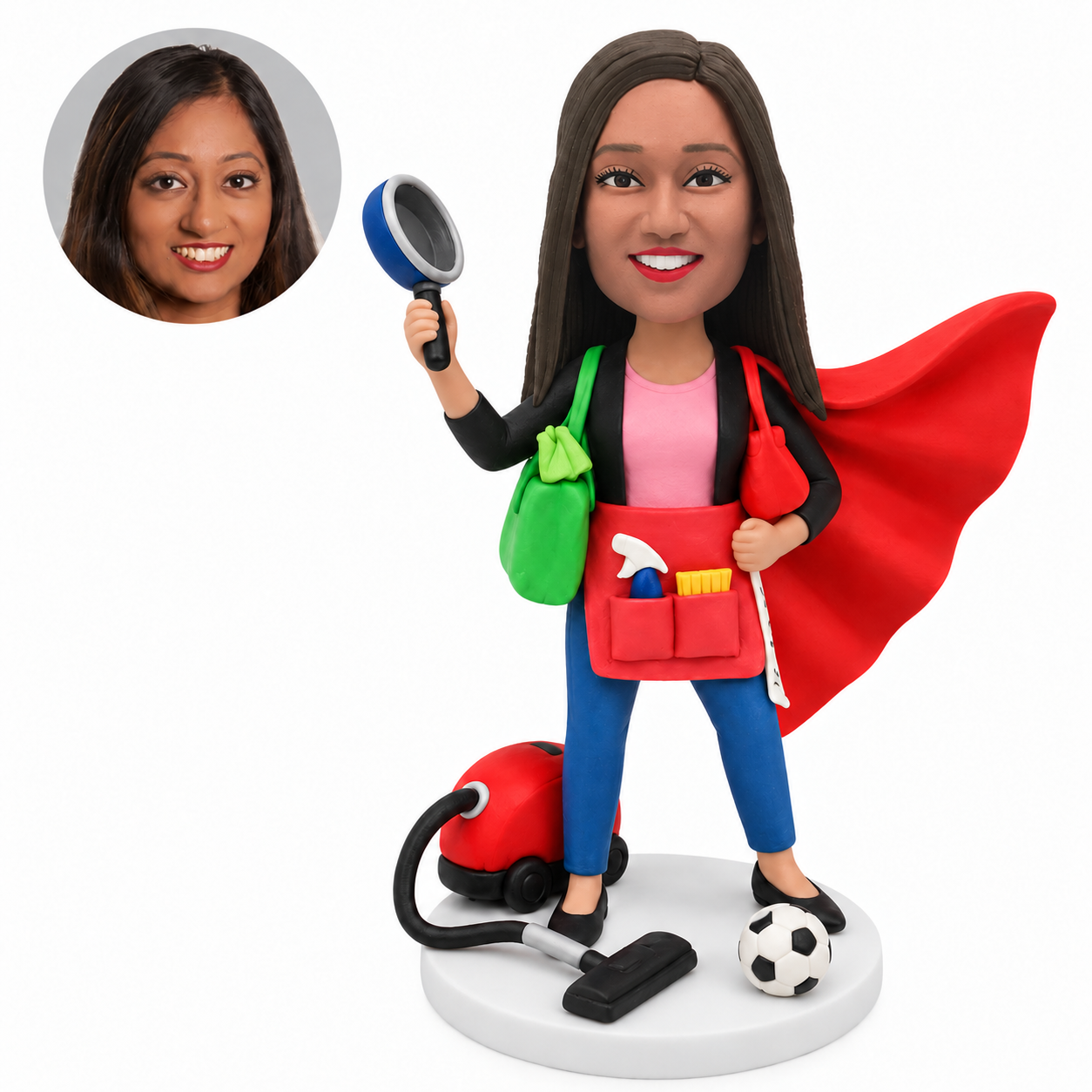 custom bobblehead figure mom in a cape holding a pan beside a vacuum cleaner