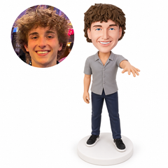 custom bobblehead figure man in a short-sleeve shirt extending one arm