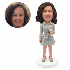 custom bobblehead figure woman in a belted shirt mini dress holding a wine goblet