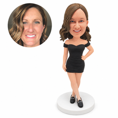 custom bobblehead figure woman in an off-shoulder fitted mini dress with one hand on her hip
