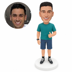 custom bobblehead figure man in a T-shirt and shorts giving a thumbs up