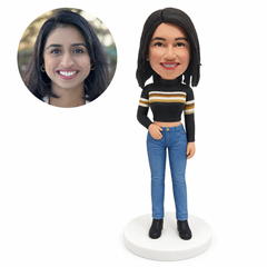 custom bobblehead figure woman in a cropped sweater and jeans with one hand at her waist