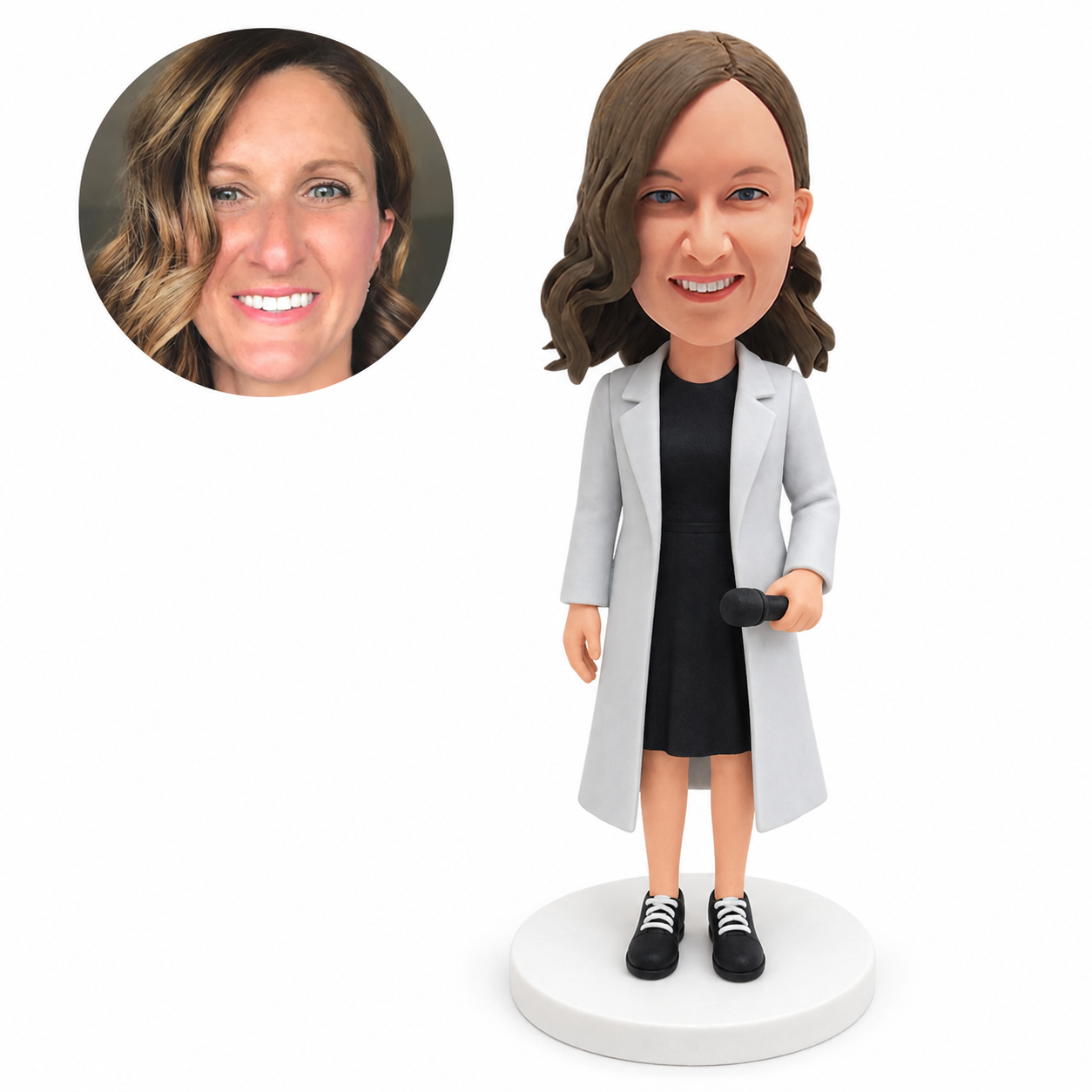 custom bobblehead figure woman in a long coat and knee-length dress holding a microphone