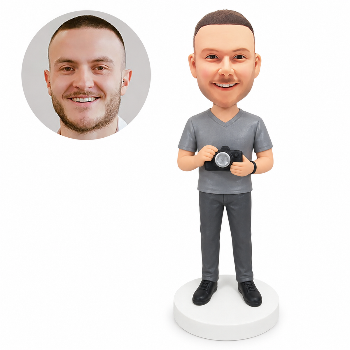custom bobblehead figure man in a gray V-neck T-shirt holding a camera with both hands