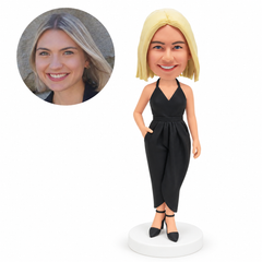 custom bobblehead figure woman in a black halter-neck jumpsuit with crossed ankles