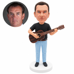 custom bobblehead figure man in a black T-shirt and light jeans playing an acoustic guitar