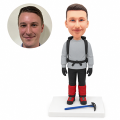 custom bobblehead figure hiker with a backpack and ice axe on a scene base
