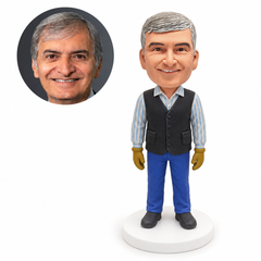 custom bobblehead figure worker in a buttoned vest and striped shirt with both gloved hands down