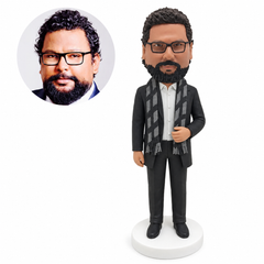 custom bobblehead figure man in a suit with a long scarf and one hand touching the scarf