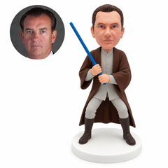 custom bobblehead figure man in a long open robe holding a staff with both knees bent