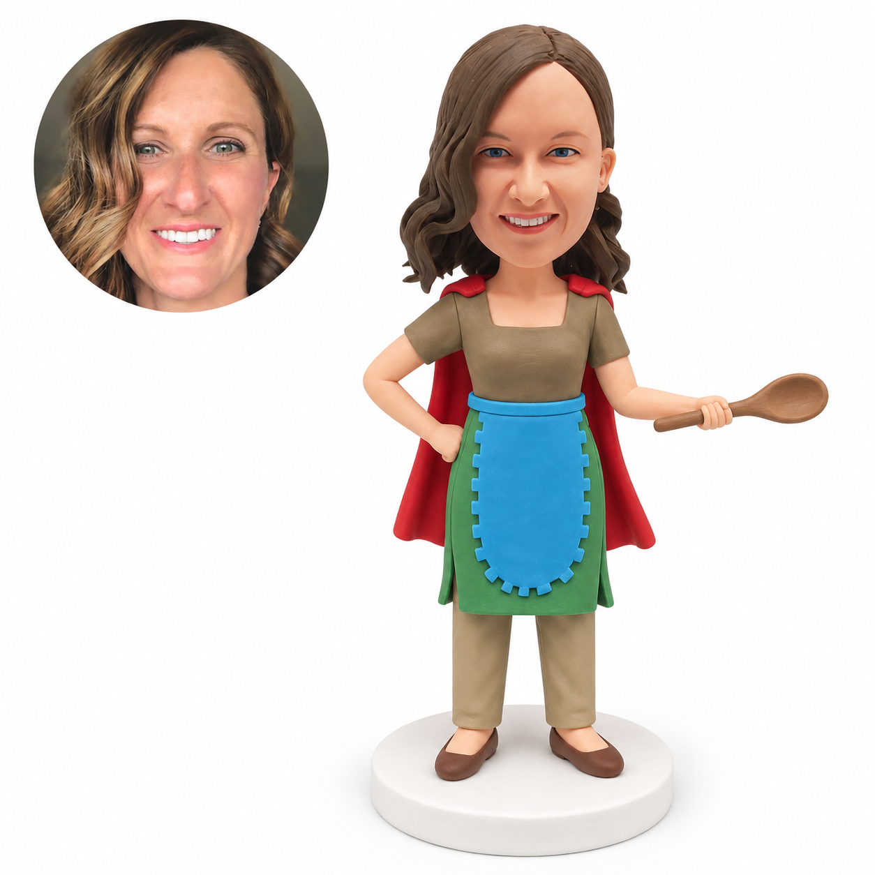 custom bobblehead figure woman in an apron and cape holding a wooden spoon