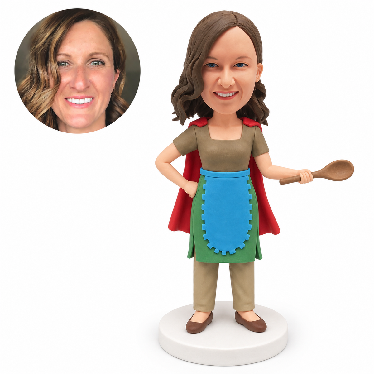 custom bobblehead figure woman in an apron and cape holding a wooden spoon