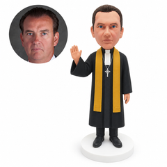 custom bobblehead figure priest in a long robe and stole with one hand raised