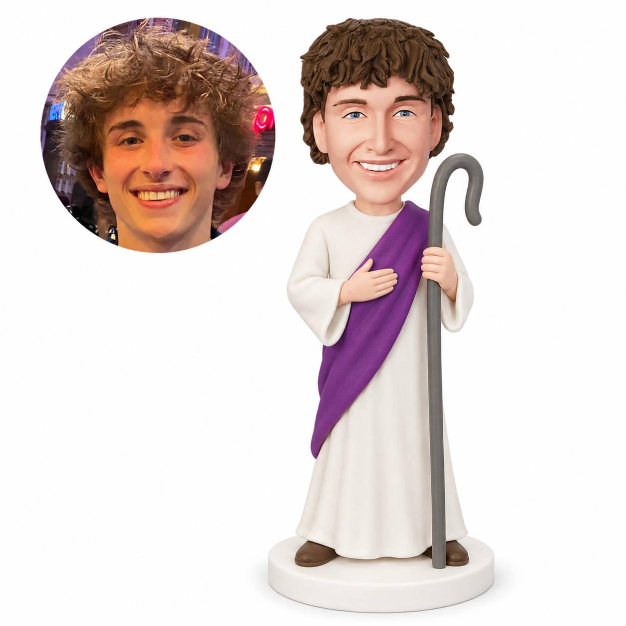 custom bobblehead figure man in a long robe and diagonal sash holding a crook staff