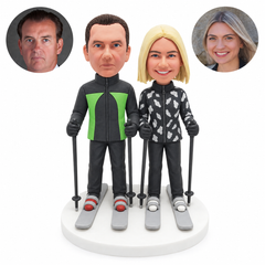 custom bobblehead figures skiing couple in zip front jackets each holding two poles