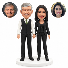 custom bobblehead figures formal couple in a waistcoat and trouser suit holding hands