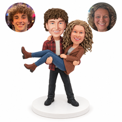 custom bobblehead figures casual man carrying a woman in a coat and jeans