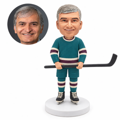 custom bobblehead figure hockey player standing upright with both hands holding a horizontal stick