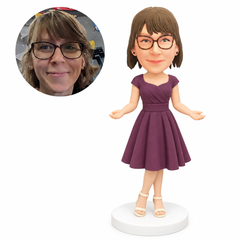 custom bobblehead figure woman in a knee-length dress with both palms turned upward