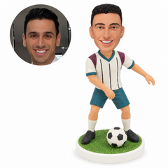 custom bobblehead figure soccer player in a wide stance with one arm swung forward
