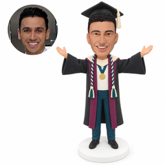 custom bobblehead figure male graduate with honor cords and a medal raising both arms