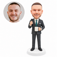 custom bobblehead figure man in a suit holding a smartphone and a mug