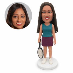 custom bobblehead figure female tennis player holding a racket at her side