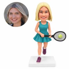 custom bobblehead figure female tennis player stepping forward with a racket held horizontally